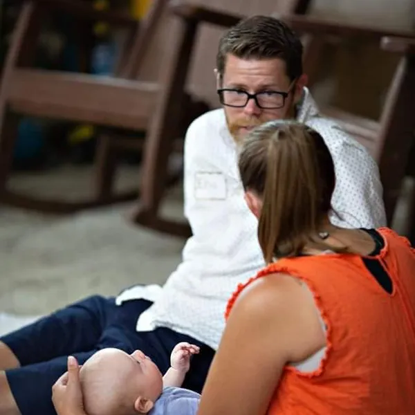 A married couple talking at the retreat